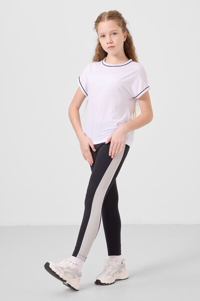TOMMYLIFE - Tommylife Toptan O Yaka Yan Şerit Detaylı Standart Fit Performans Kız Çocuk Tayt Takım 75191 Beyaz Siyah TOMMYLIFE - Tommylife Toptan O Yaka Yan Şerit Detaylı Standart Fit Performans Kız Çocuk Tayt Takım 75191 Beyaz Siyah
