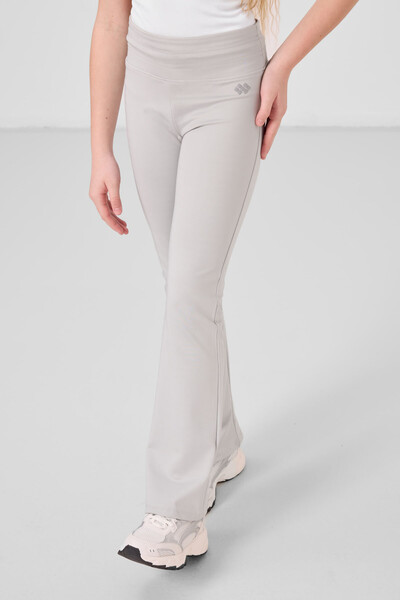 TOMMYLIFE - Tommylife Toptan Esnek Standart Fit Basic Performans İspanyol Paça Kız Çocuk Tayt 75193 Taş
